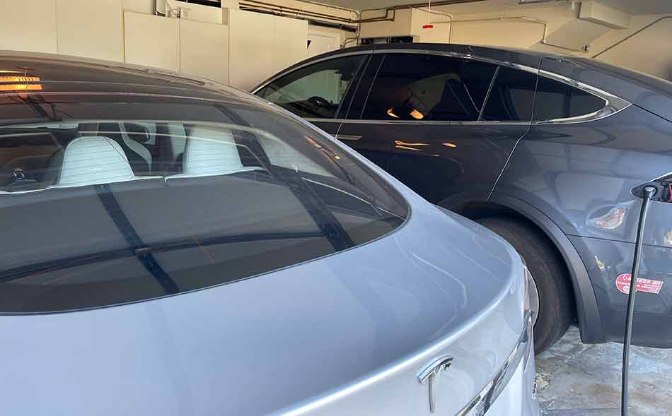 Tesla Model S and Model X in a garage